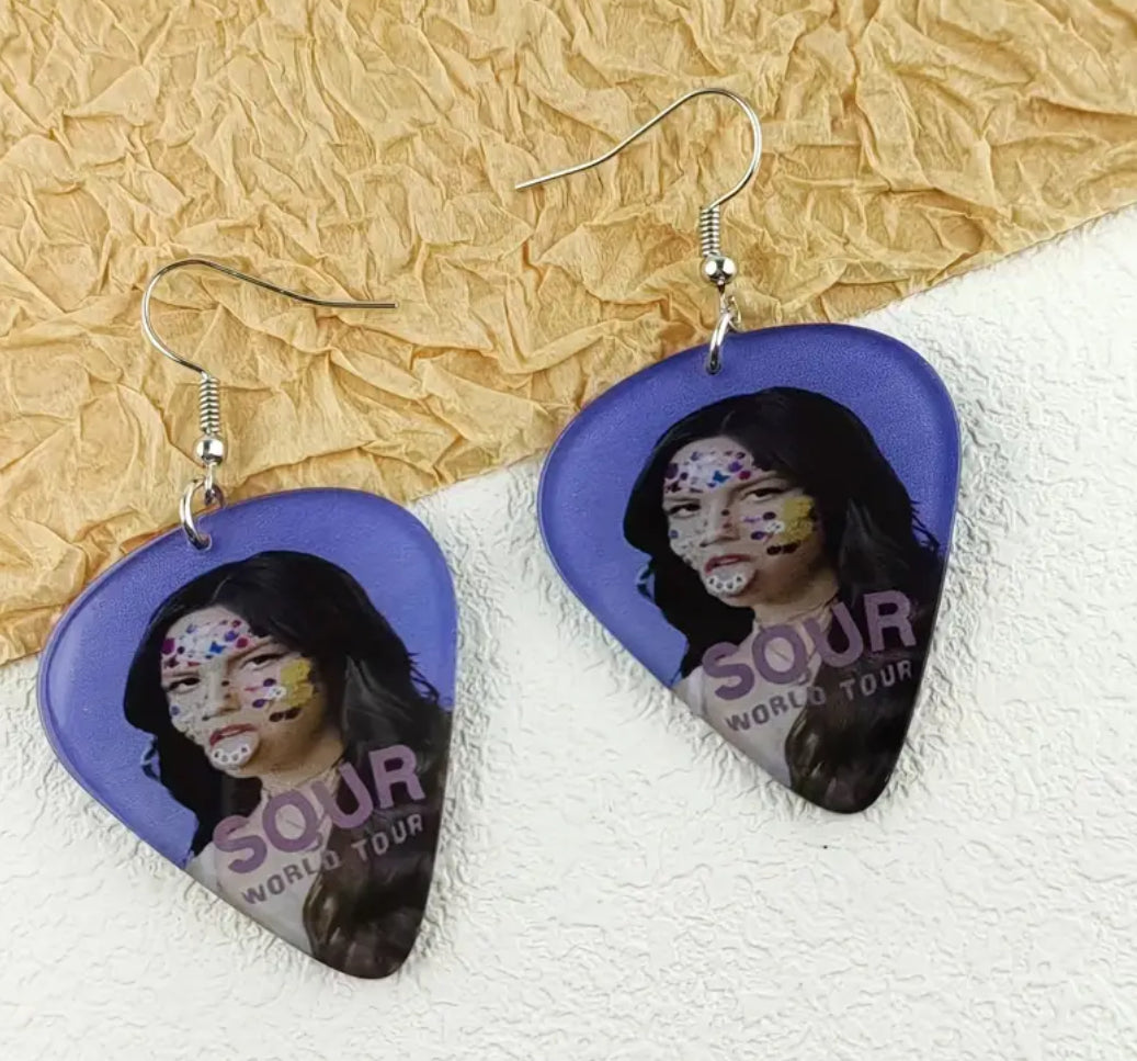 GUTS tour earrings