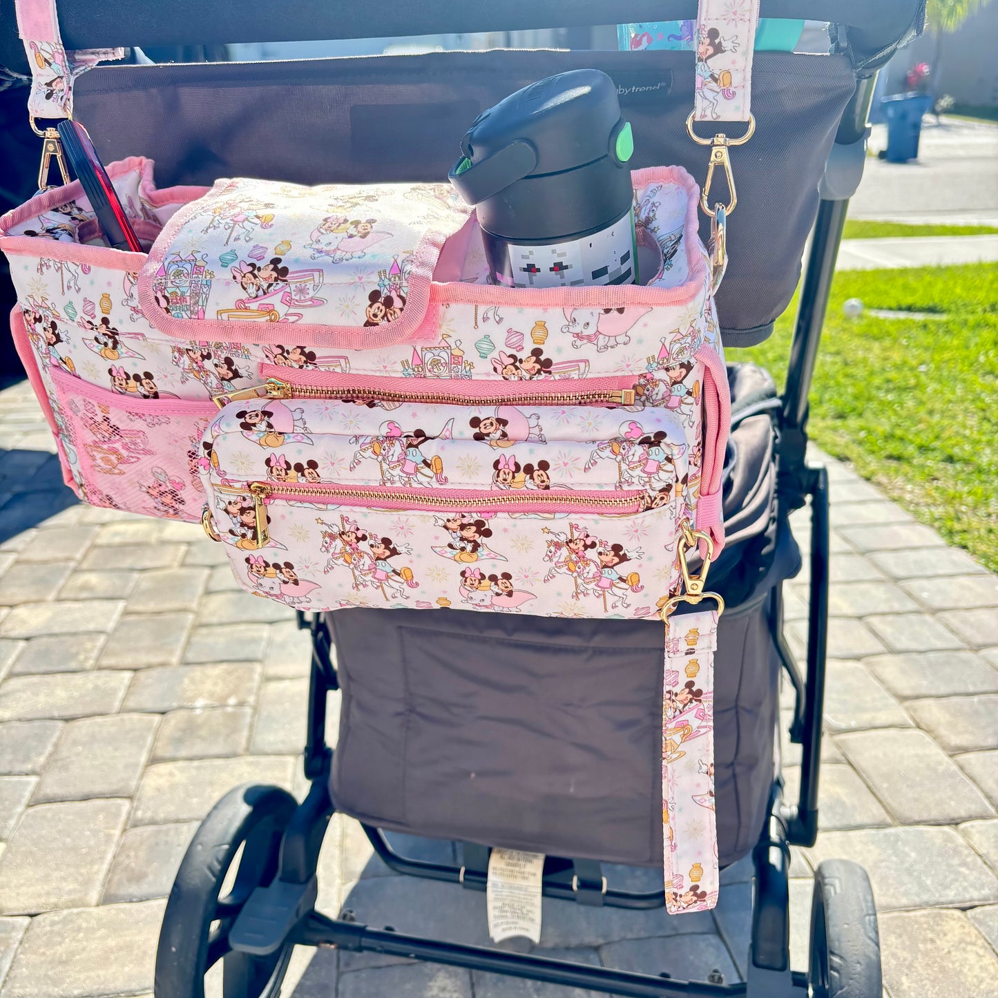 Pink Magical Main Street Stroller Caddy Organizer with Insulated Cup Holders | Detachable Wristlet | Universal Stroller & Wagon Organizer