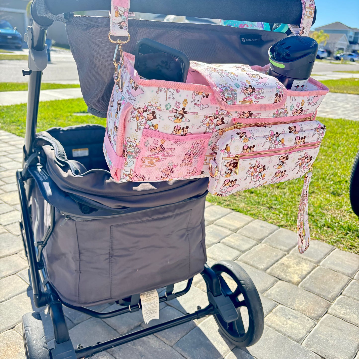 Pink Magical Main Street Stroller Caddy Organizer with Insulated Cup Holders | Detachable Wristlet | Universal Stroller & Wagon Organizer