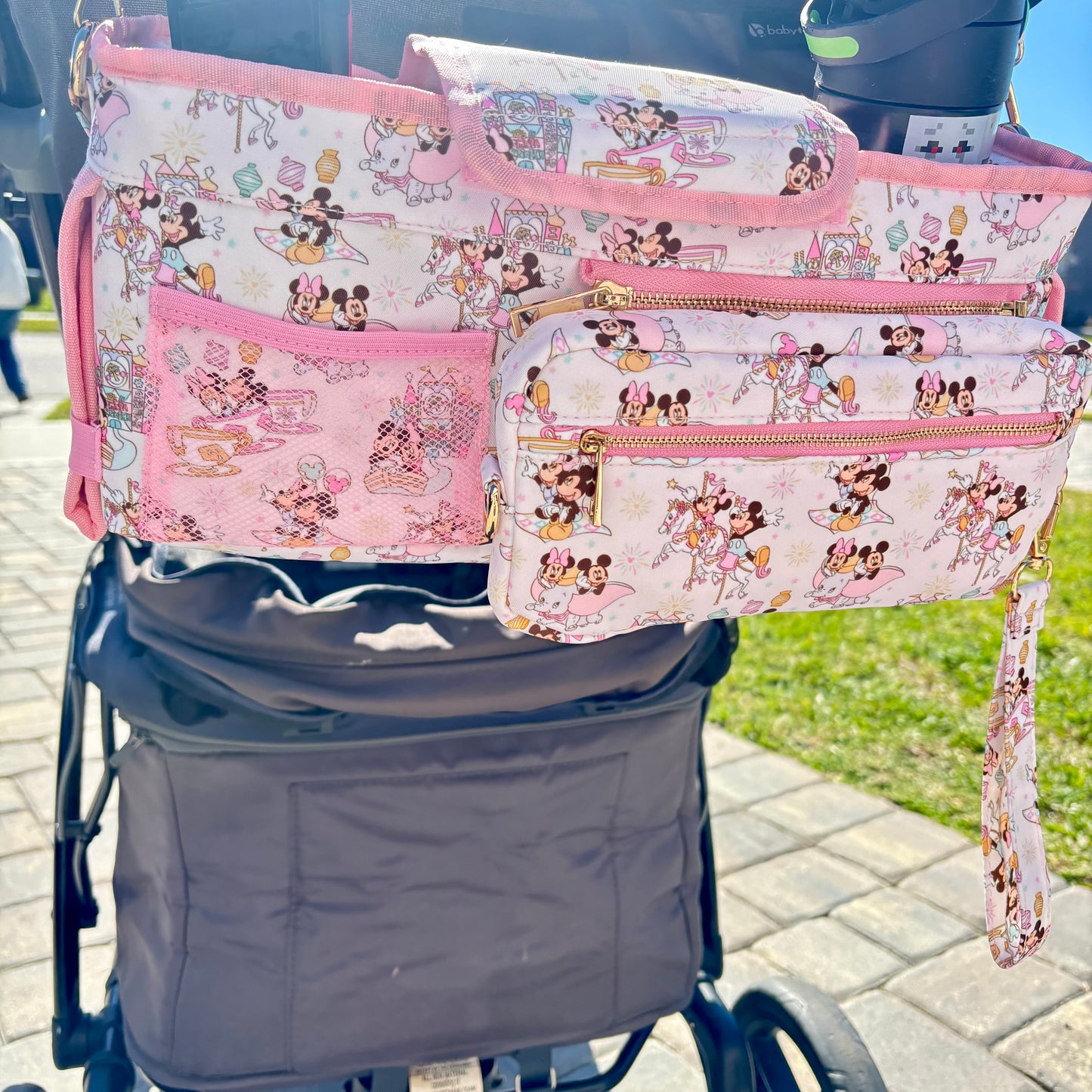 Pink Magical Main Street Stroller Caddy Organizer with Insulated Cup Holders | Detachable Wristlet | Universal Stroller & Wagon Organizer