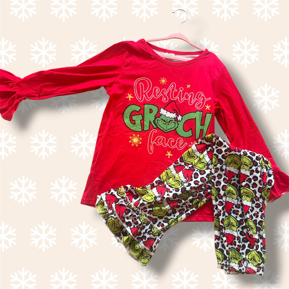 Girls Resting-Grinch Face Christmas Bell Bottom Pants Set | Red Ruffle Sleeve Top & Holiday Flare Pants